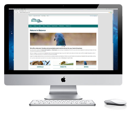 iMac Displaying Nature In Balance Website Homepage